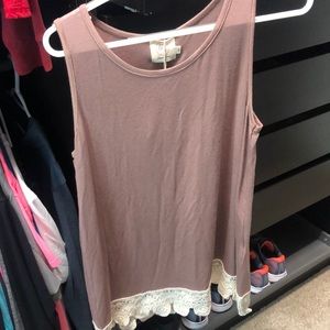Women’s small top color is Mauve